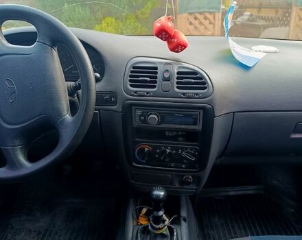 Красный Дэу Нубира, объемом двигателя 1.6 л и пробегом 183 тыс. км за 2500 $, фото 5 на Automoto.ua