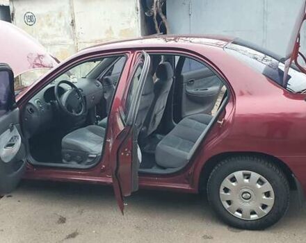 Красный Дэу Нубира, объемом двигателя 1.6 л и пробегом 275 тыс. км за 3700 $, фото 1 на Automoto.ua