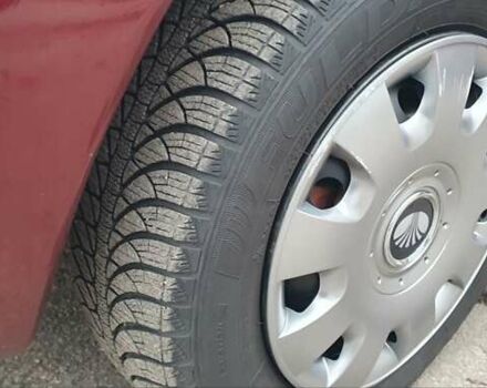 Красный Дэу Нубира, объемом двигателя 1.6 л и пробегом 275 тыс. км за 3700 $, фото 7 на Automoto.ua