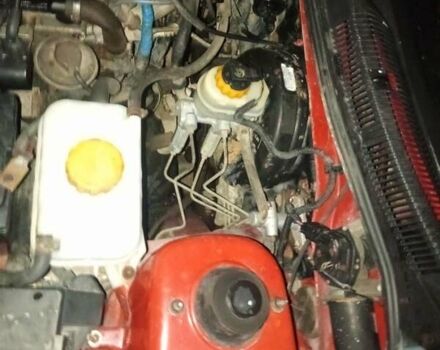 Красный Дэу Нубира, объемом двигателя 1.6 л и пробегом 250 тыс. км за 750 $, фото 2 на Automoto.ua