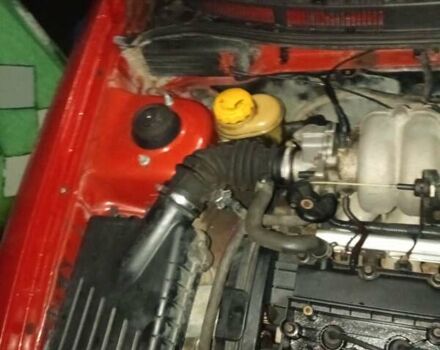 Красный Дэу Нубира, объемом двигателя 1.6 л и пробегом 250 тыс. км за 750 $, фото 1 на Automoto.ua