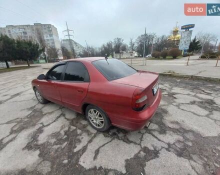 Красный Дэу Нубира, объемом двигателя 2 л и пробегом 350 тыс. км за 1500 $, фото 11 на Automoto.ua