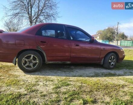 Червоний Деу Нубіра, об'ємом двигуна 2 л та пробігом 370 тис. км за 3100 $, фото 5 на Automoto.ua