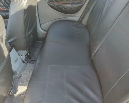 Червоний Деу Нубіра, об'ємом двигуна 2 л та пробігом 370 тис. км за 3100 $, фото 7 на Automoto.ua