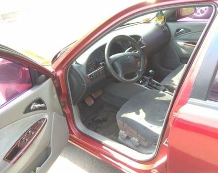 Червоний Деу Нубіра, об'ємом двигуна 2 л та пробігом 250 тис. км за 2800 $, фото 13 на Automoto.ua