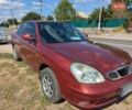 Красный Дэу Нубира, объемом двигателя 2 л и пробегом 383 тыс. км за 2800 $, фото 1 на Automoto.ua