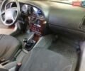 Красный Дэу Нубира, объемом двигателя 2 л и пробегом 383 тыс. км за 2800 $, фото 3 на Automoto.ua