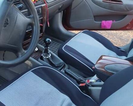 Красный Дэу Нубира, объемом двигателя 2 л и пробегом 300 тыс. км за 1499 $, фото 8 на Automoto.ua