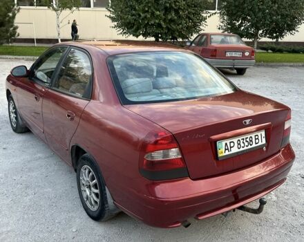 Красный Дэу Нубира, объемом двигателя 2 л и пробегом 302 тыс. км за 1900 $, фото 4 на Automoto.ua
