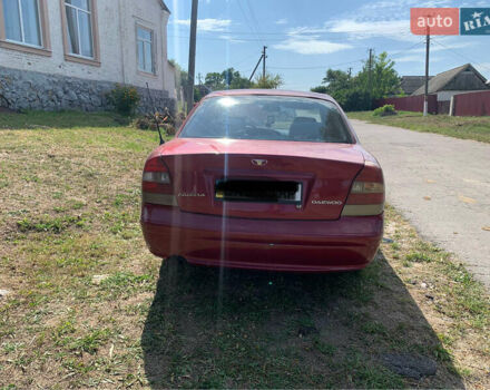 Красный Дэу Нубира, объемом двигателя 2 л и пробегом 314 тыс. км за 3000 $, фото 6 на Automoto.ua