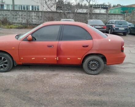 Червоний Деу Нубіра, об'ємом двигуна 2 л та пробігом 321 тис. км за 1600 $, фото 2 на Automoto.ua