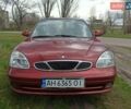 Красный Дэу Нубира, объемом двигателя 2 л и пробегом 305 тыс. км за 1700 $, фото 1 на Automoto.ua