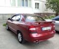 Красный Дэу Нубира, объемом двигателя 2 л и пробегом 166 тыс. км за 3500 $, фото 1 на Automoto.ua