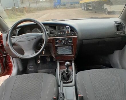 Червоний Деу Нубіра, об'ємом двигуна 2 л та пробігом 321 тис. км за 1600 $, фото 6 на Automoto.ua