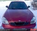 Красный Дэу Нубира, объемом двигателя 2 л и пробегом 250 тыс. км за 1400 $, фото 1 на Automoto.ua