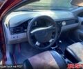Красный Дэу Нубира, объемом двигателя 1.6 л и пробегом 225 тыс. км за 3500 $, фото 4 на Automoto.ua