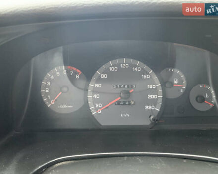 Красный Дэу Нубира, объемом двигателя 2 л и пробегом 314 тыс. км за 3000 $, фото 4 на Automoto.ua