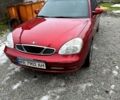 Красный Дэу Нубира, объемом двигателя 2 л и пробегом 300 тыс. км за 2500 $, фото 1 на Automoto.ua