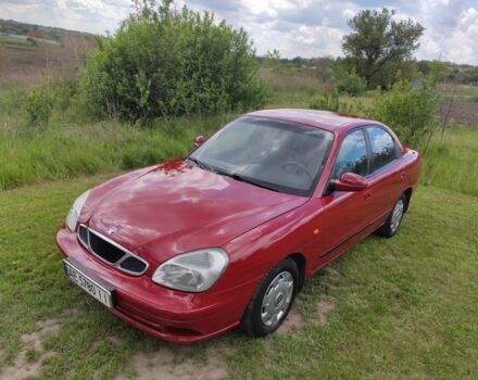 Красный Дэу Нубира, объемом двигателя 2 л и пробегом 357 тыс. км за 2600 $, фото 1 на Automoto.ua
