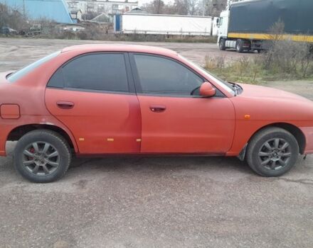 Червоний Деу Нубіра, об'ємом двигуна 2 л та пробігом 321 тис. км за 1600 $, фото 3 на Automoto.ua