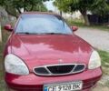 Красный Дэу Нубира, объемом двигателя 2 л и пробегом 399 тыс. км за 2305 $, фото 1 на Automoto.ua