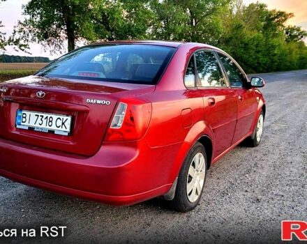 Красный Дэу Нубира, объемом двигателя 1.6 л и пробегом 225 тыс. км за 3500 $, фото 2 на Automoto.ua