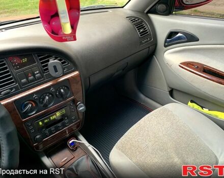 Красный Дэу Нубира, объемом двигателя 2 л и пробегом 314 тыс. км за 3000 $, фото 6 на Automoto.ua