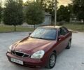 Красный Дэу Нубира, объемом двигателя 2 л и пробегом 302 тыс. км за 2050 $, фото 1 на Automoto.ua