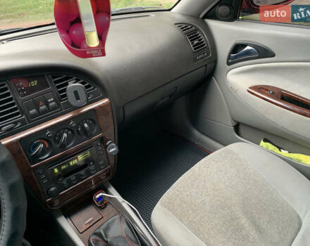 Красный Дэу Нубира, объемом двигателя 2 л и пробегом 314 тыс. км за 3000 $, фото 3 на Automoto.ua