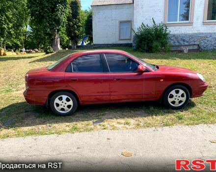 Красный Дэу Нубира, объемом двигателя 2 л и пробегом 314 тыс. км за 3000 $, фото 7 на Automoto.ua