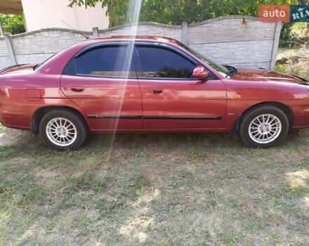 Червоний Деу Нубіра, об'ємом двигуна 1.6 л та пробігом 138 тис. км за 3500 $, фото 1 на Automoto.ua