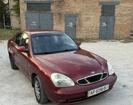 Красный Дэу Нубира, объемом двигателя 2 л и пробегом 302 тыс. км за 1900 $, фото 2 на Automoto.ua