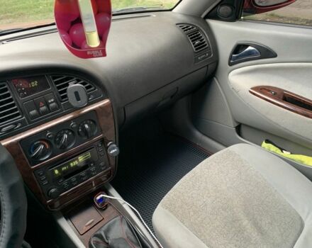 Червоний Деу Нубіра, об'ємом двигуна 2 л та пробігом 314 тис. км за 3000 $, фото 3 на Automoto.ua