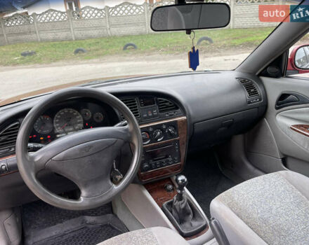 Красный Дэу Нубира, объемом двигателя 2 л и пробегом 150 тыс. км за 2450 $, фото 5 на Automoto.ua