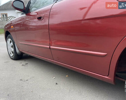 Красный Дэу Нубира, объемом двигателя 2 л и пробегом 150 тыс. км за 2450 $, фото 7 на Automoto.ua