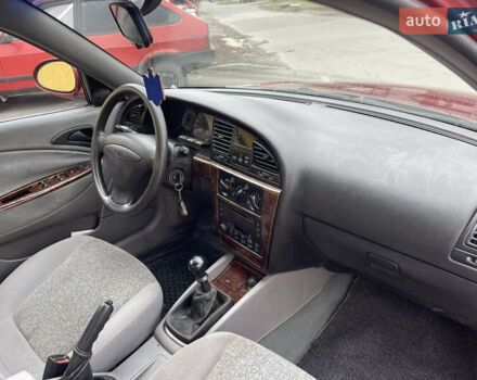 Красный Дэу Нубира, объемом двигателя 2 л и пробегом 150 тыс. км за 2450 $, фото 9 на Automoto.ua