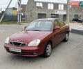 Красный Дэу Нубира, объемом двигателя 2 л и пробегом 150 тыс. км за 2450 $, фото 1 на Automoto.ua