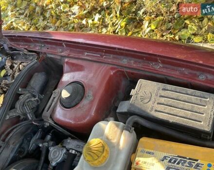 Красный Дэу Нубира, объемом двигателя 1.6 л и пробегом 190 тыс. км за 2350 $, фото 26 на Automoto.ua