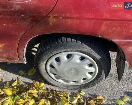 Красный Дэу Нубира, объемом двигателя 1.6 л и пробегом 190 тыс. км за 2350 $, фото 19 на Automoto.ua