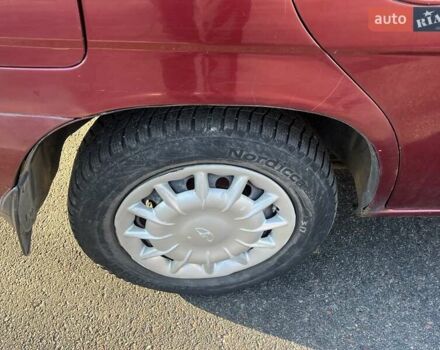 Красный Дэу Нубира, объемом двигателя 1.6 л и пробегом 190 тыс. км за 2350 $, фото 20 на Automoto.ua