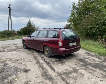 Червоний Деу Нубіра, об'ємом двигуна 2 л та пробігом 300 тис. км за 950 $, фото 1 на Automoto.ua