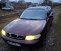 Красный Дэу Нубира, объемом двигателя 1.6 л и пробегом 350 тыс. км за 1200 $, фото 1 на Automoto.ua