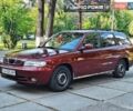 Красный Дэу Нубира, объемом двигателя 1.6 л и пробегом 270 тыс. км за 2400 $, фото 1 на Automoto.ua