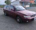 Красный Дэу Нубира, объемом двигателя 1.6 л и пробегом 230 тыс. км за 2200 $, фото 1 на Automoto.ua