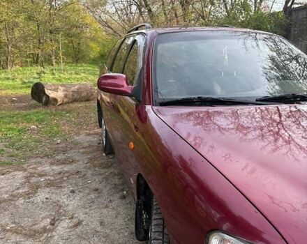 Красный Дэу Нубира, объемом двигателя 1.6 л и пробегом 190 тыс. км за 2350 $, фото 3 на Automoto.ua