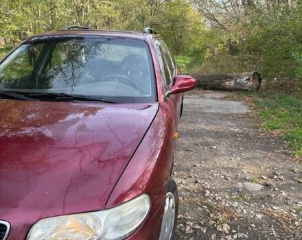 Красный Дэу Нубира, объемом двигателя 1.6 л и пробегом 190 тыс. км за 2350 $, фото 13 на Automoto.ua