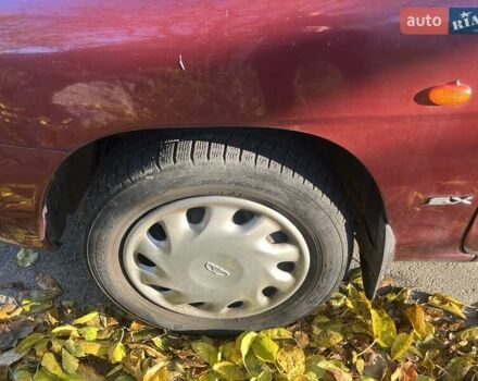 Красный Дэу Нубира, объемом двигателя 1.6 л и пробегом 190 тыс. км за 2350 $, фото 23 на Automoto.ua