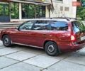 Красный Дэу Нубира, объемом двигателя 1.6 л и пробегом 270 тыс. км за 2400 $, фото 3 на Automoto.ua