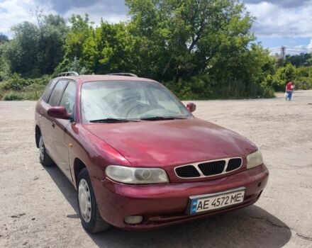 Красный Дэу Нубира, объемом двигателя 1.6 л и пробегом 220 тыс. км за 1350 $, фото 1 на Automoto.ua