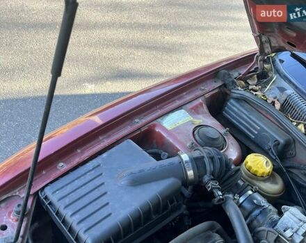 Красный Дэу Нубира, объемом двигателя 1.6 л и пробегом 190 тыс. км за 2350 $, фото 25 на Automoto.ua